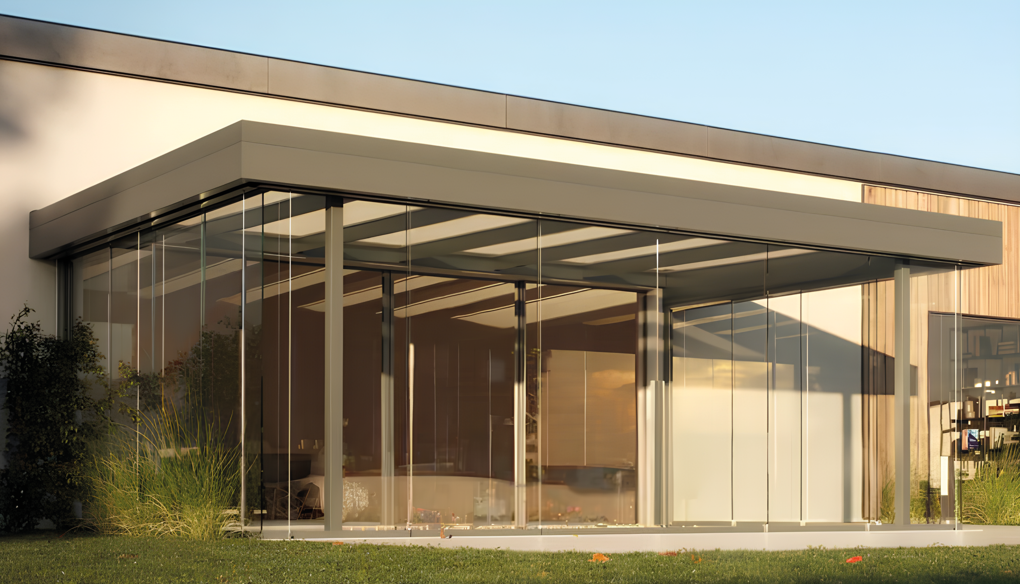 Commercial building featuring Hurrishield impact‑resistant windows and doors designed for enhanced safety and storm protection.