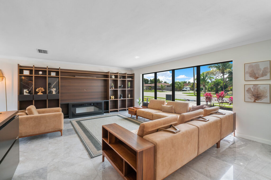 living room with large impact resistant windows for Florida homes