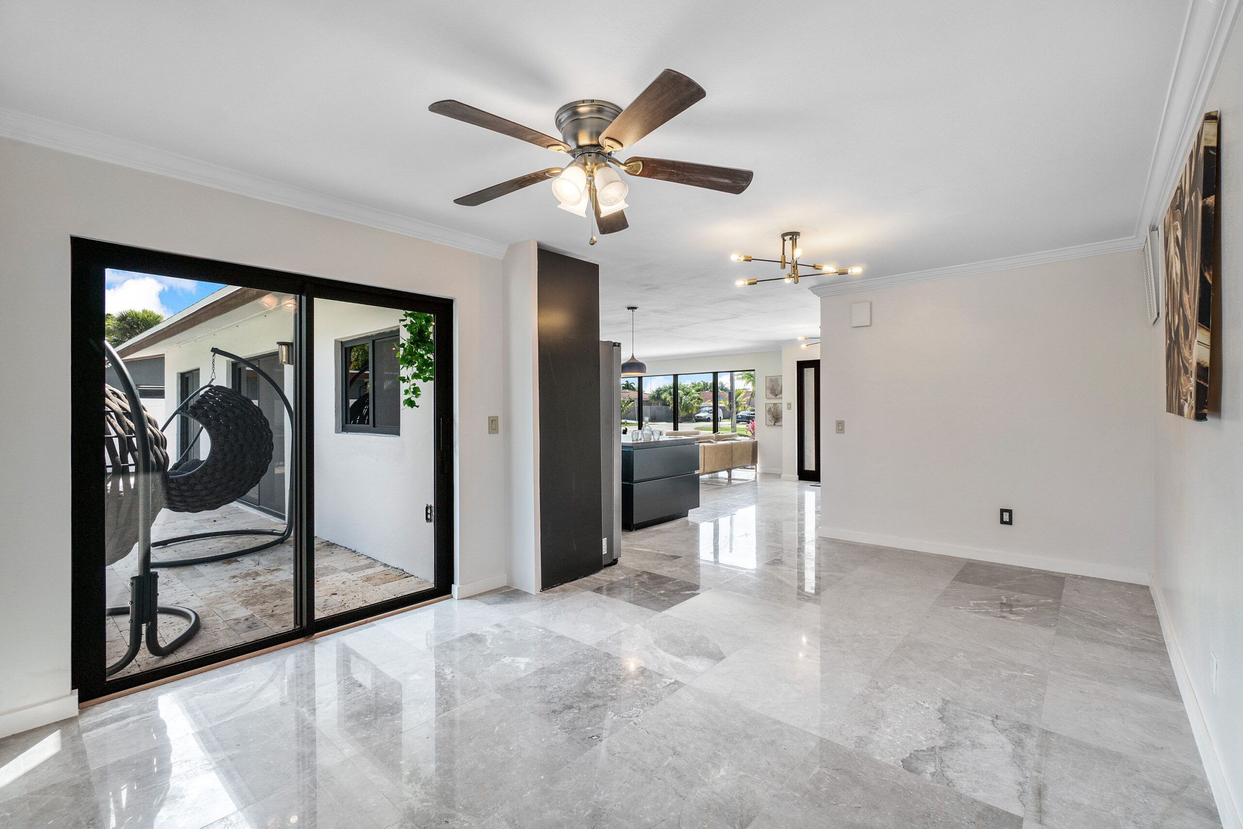 Luminous living room in Florida featuring non impact doors